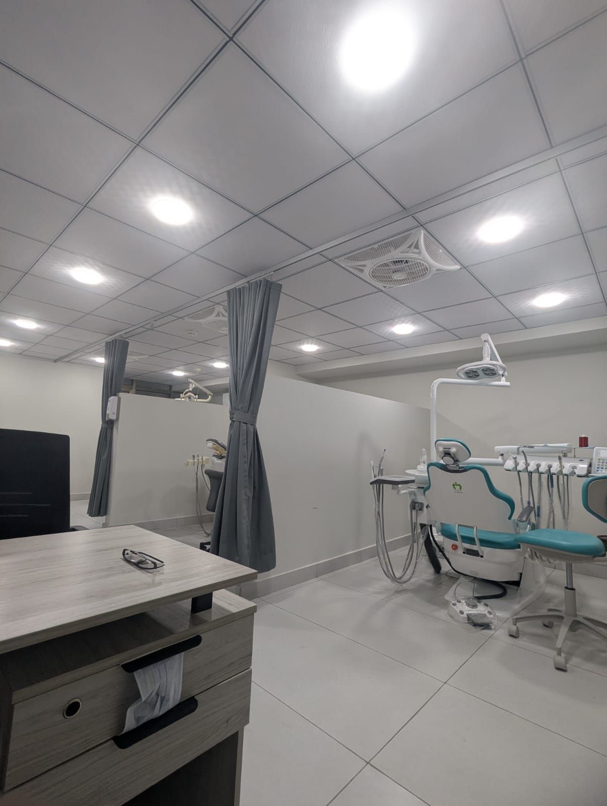Treatment bays behind privacy curtains
